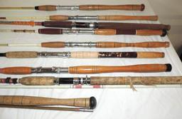 Dawai 1572 Surf casting rod, 7 wood handled rods and 2 piece cork handled rod.