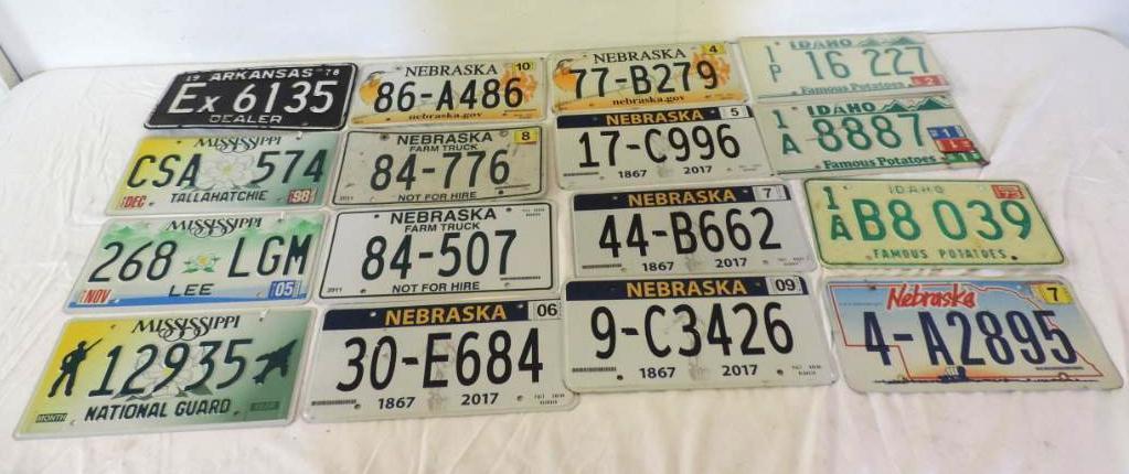 16 vintage license plates.