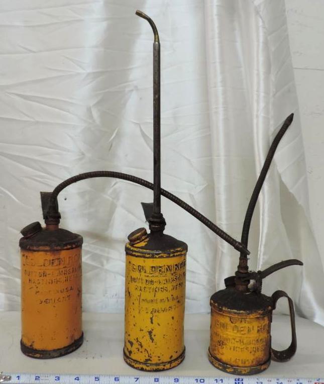 3 Golden Rod oil cans.