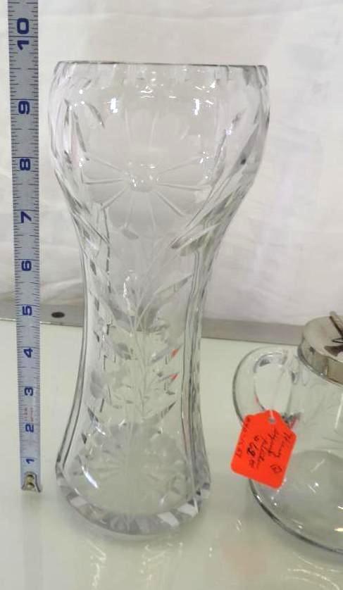10" cut glass vase and 4.5" Heisey syrup pitcher both are good condition.