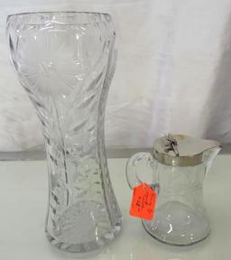 10" cut glass vase and 4.5" Heisey syrup pitcher both are good condition.