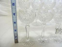 Nine 6.5" cut glass wine glasses, 11-4.5" cut glass snifters and a cut glass jam jar.