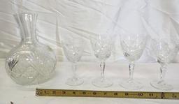 8.5" early cut glass decanter with 4 cut glass wine glasses.