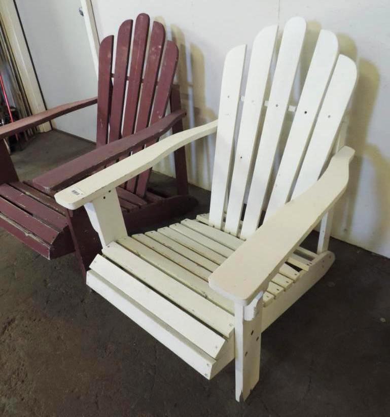 2 wooden Adirondack chairs.