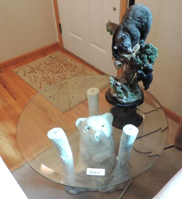 Glass top bear end table with 18" bear sculpture.