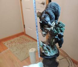 Glass top bear end table with 18" bear sculpture.