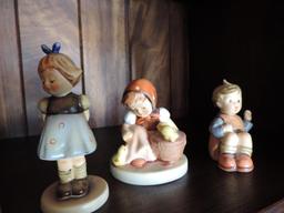 Hummel figurine assortment.