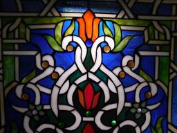 Stained glass figural artwork panel