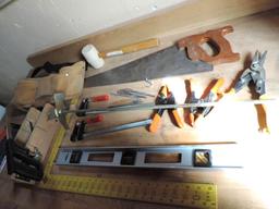 Large assortment of hand tools.