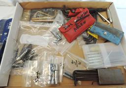 Assortment of drill bits and Allen wrenches.