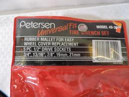 Peterson tire wrench set, Aquapel and 3 emergency hammers.