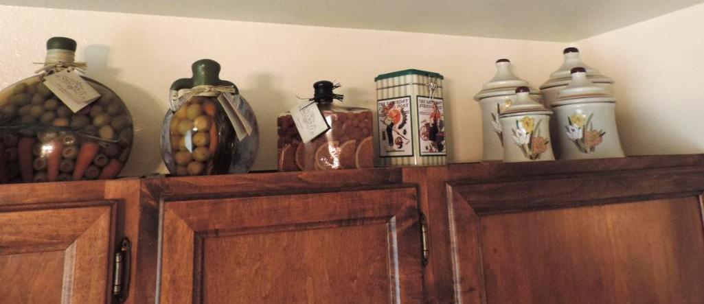 Contents above kitchen cabinets.