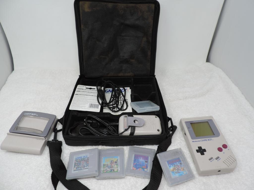 Nintendo Gameboy with games and case.