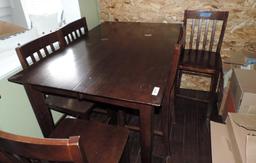 Bar height table with 6 chairs.
