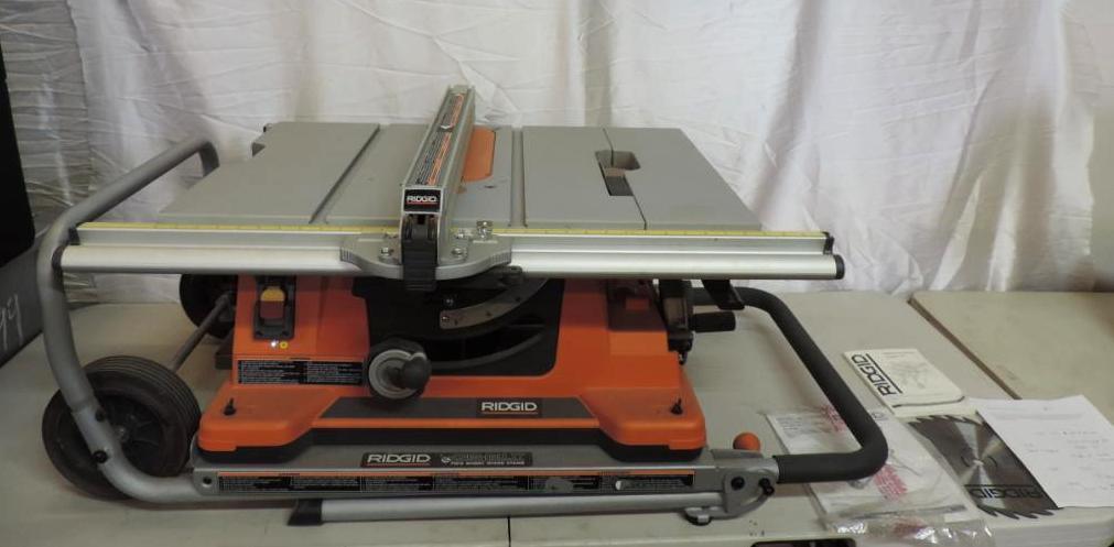 Rigid TS2400LS 10" table saw with folding 2 wheel work stand.