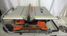 Rigid TS2400LS 10" table saw with folding 2 wheel work stand.