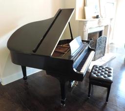 Beautiful black Steinway and Sons grand piano.