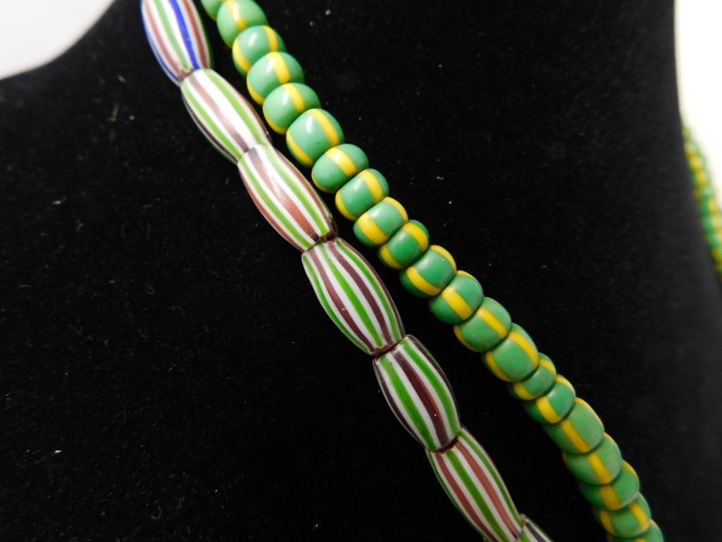 Two green Rick Rice glass bead necklaces
