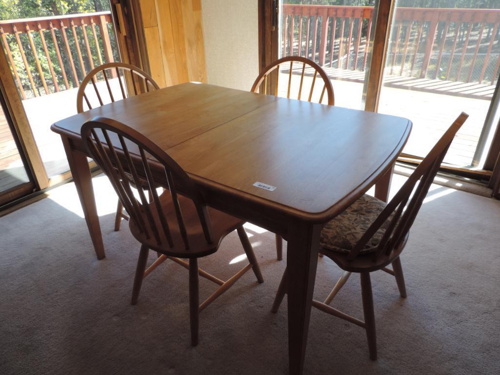 Oak table with 4 chairs.