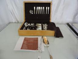 Rogers Bothers IS Daffodil flatware set with birch wood case.