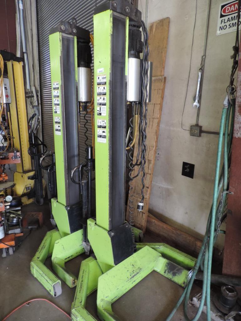 Two ARI- Hetra 1500lb mobile lifts.