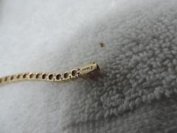 14K gold /diamond tennis bracelet.