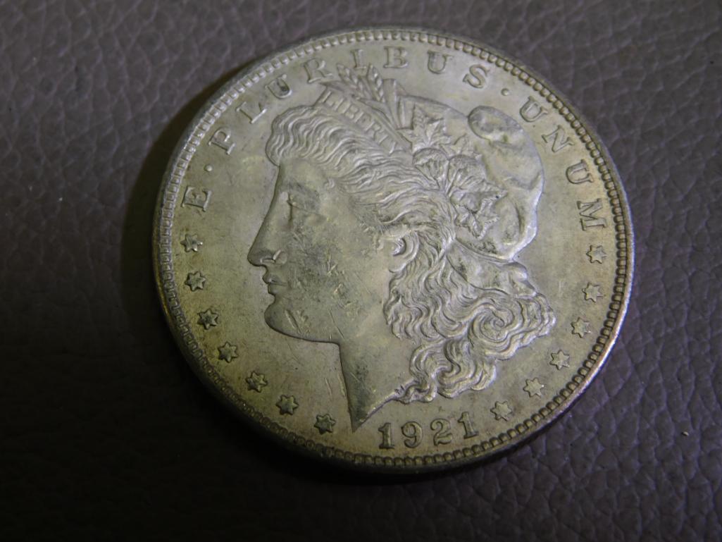 Three 1921 Morgan silver dollar coins