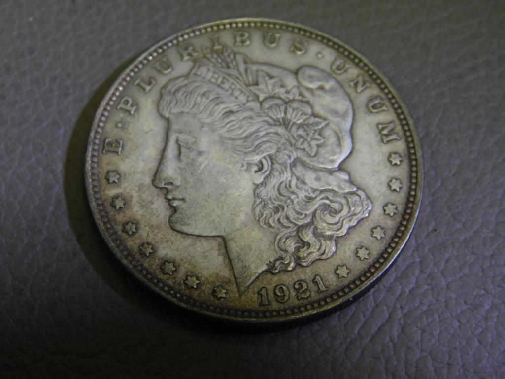 Three 1921 Morgan silver dollar coins