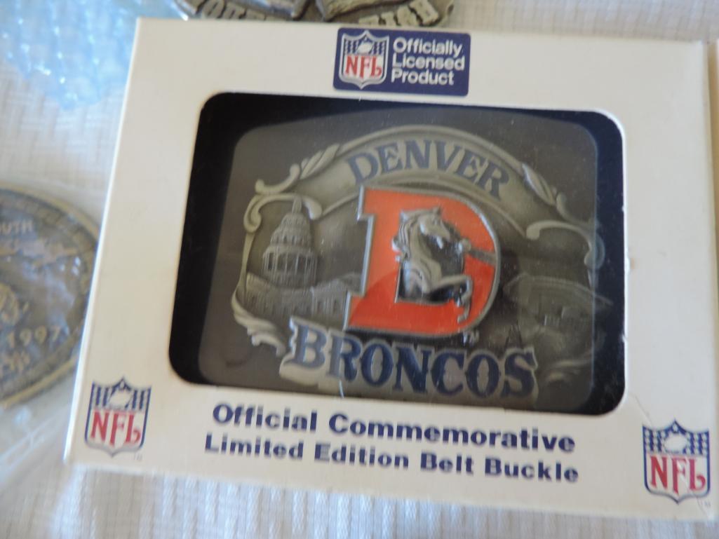 Denver Broncos belt buckles.