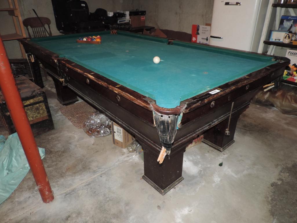 Antique Brunswick Balke Calendar Monarch pool table.