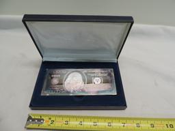 AHS 4oz .999 silver one hundred dollar bill.