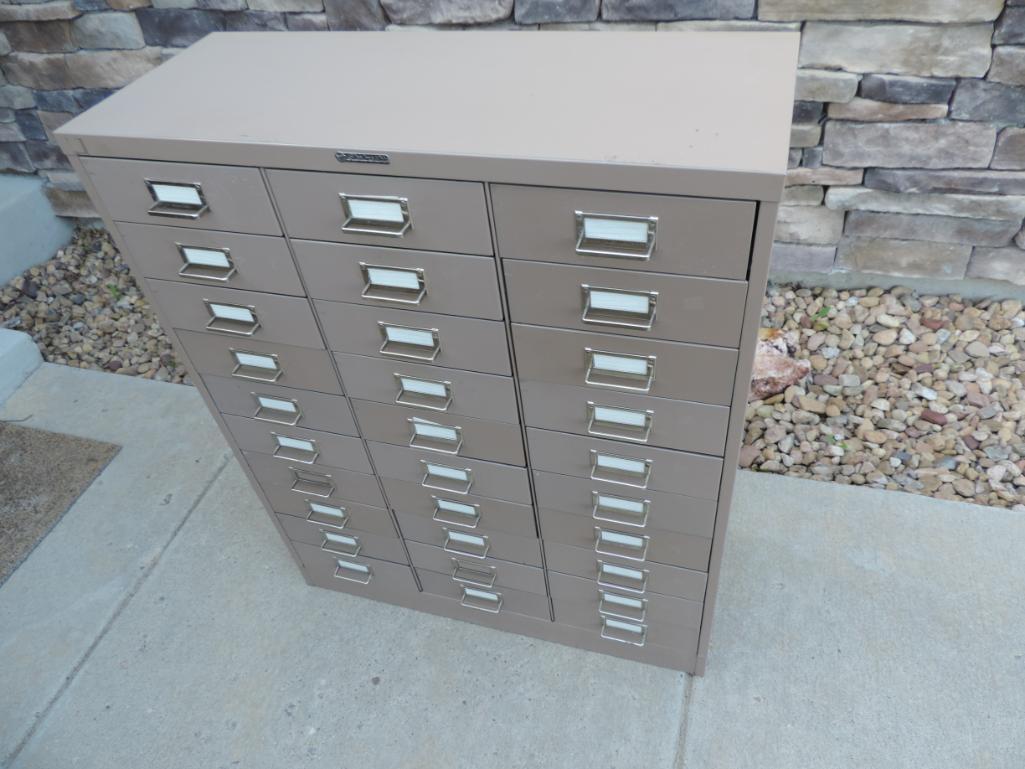 Steelmaster 30 drawer metal multi-drawer cabinet.