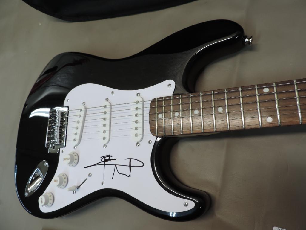 Pete Townsend autographed guitar.