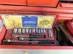 Red toolbox with hand tools