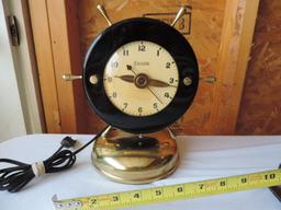 Ensign ship's wheel clock.