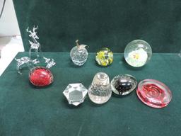 Art glass paperweights and crystal.