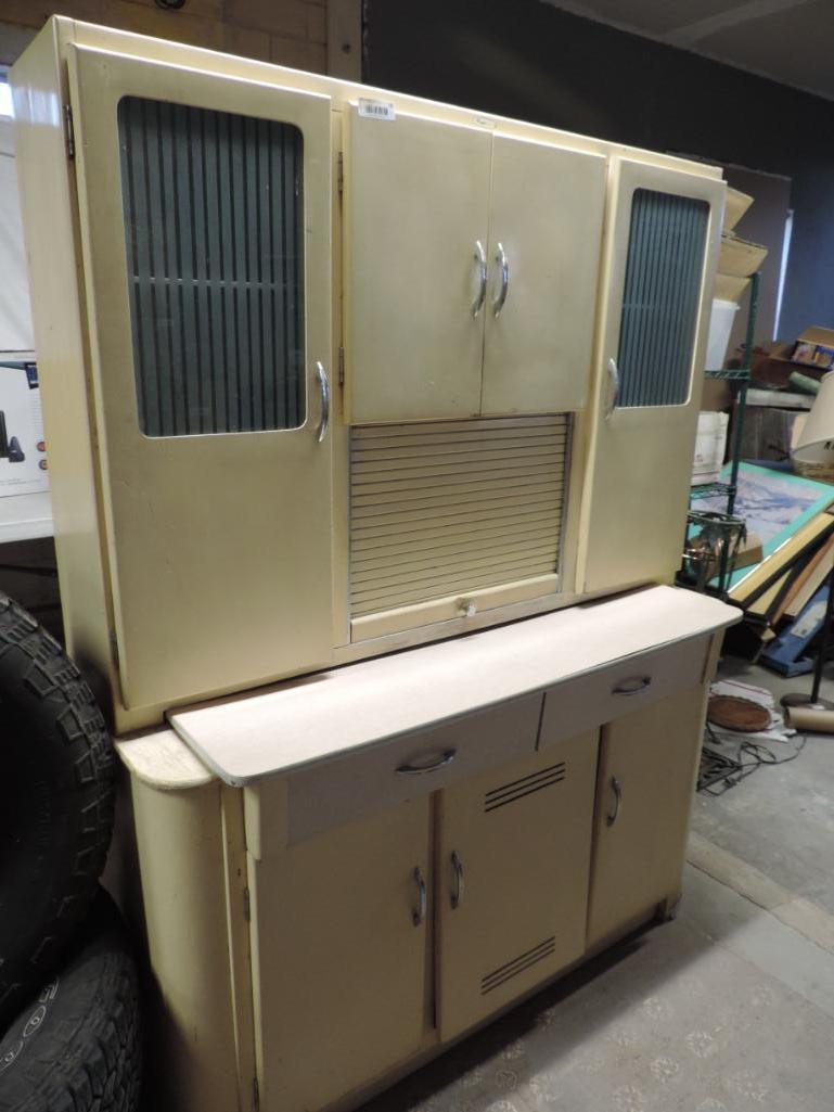 Cool Mid Century kitchen cabinet.