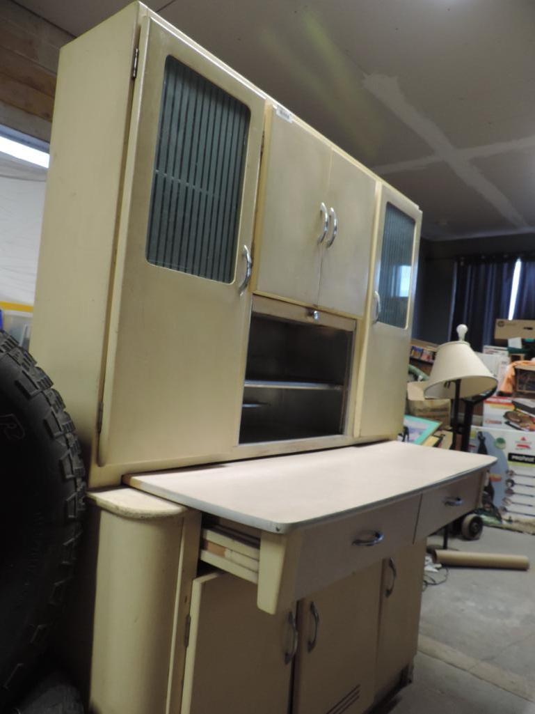 Cool Mid Century kitchen cabinet.