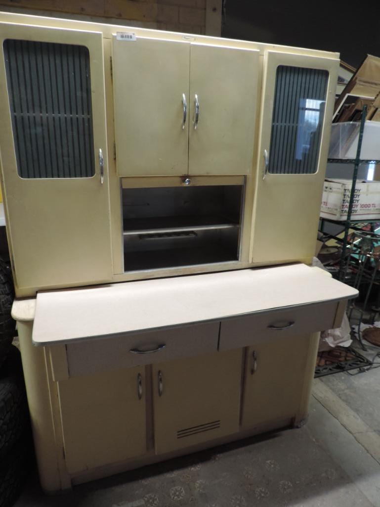 Cool Mid Century kitchen cabinet.