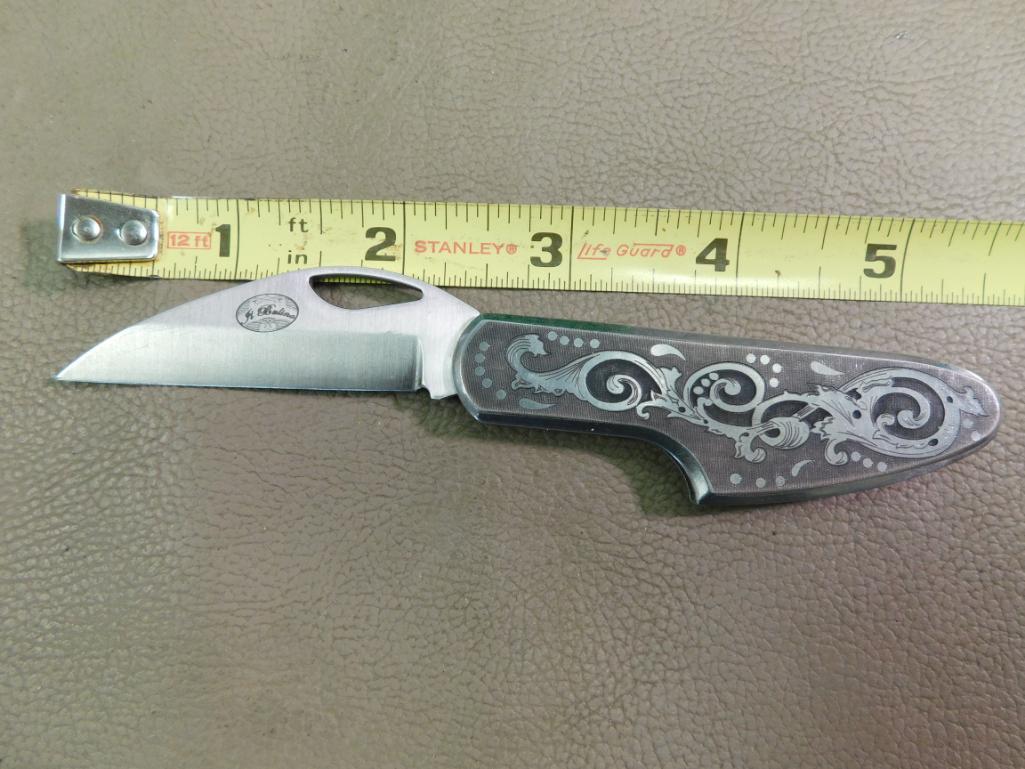 Famas engraved hawkbill knife