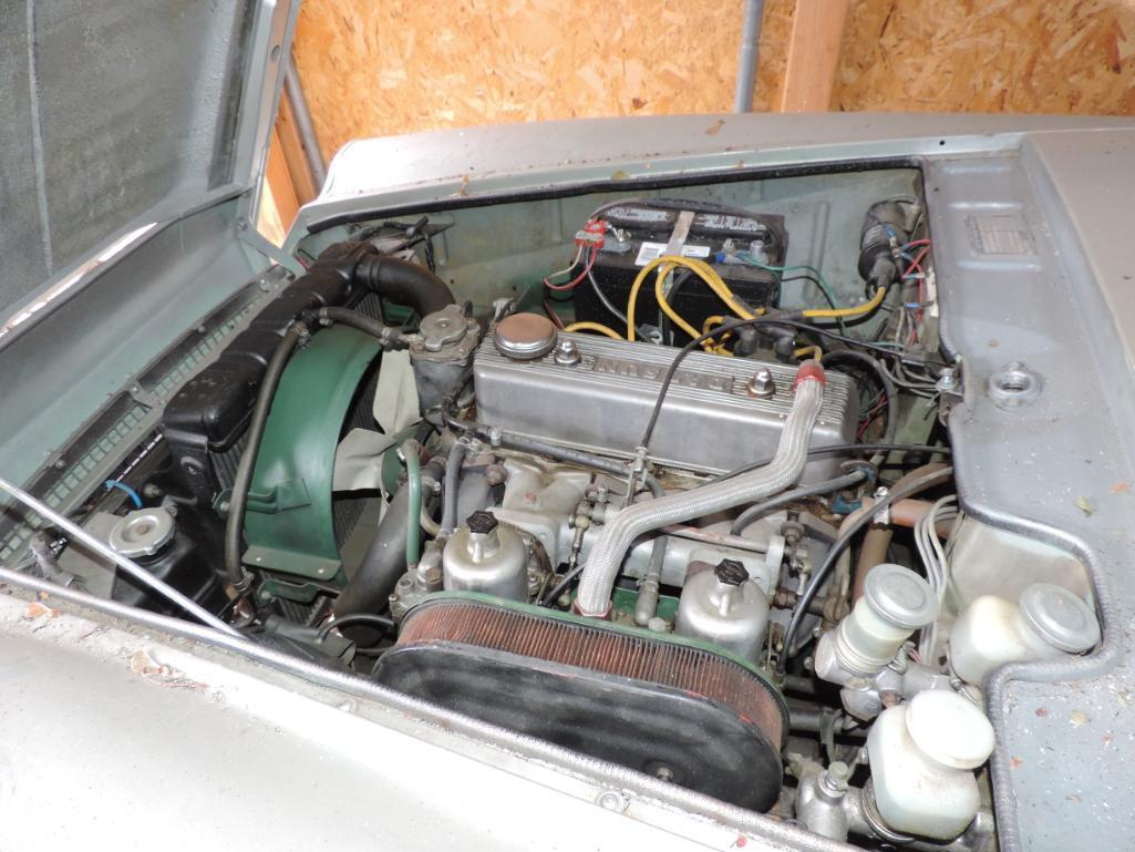 Silver 1967 Datsun 1600 Convertible showing 21K Miles