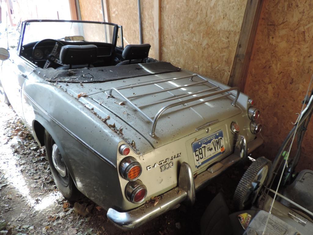 Silver 1967 Datsun 1600 Convertible showing 21K Miles