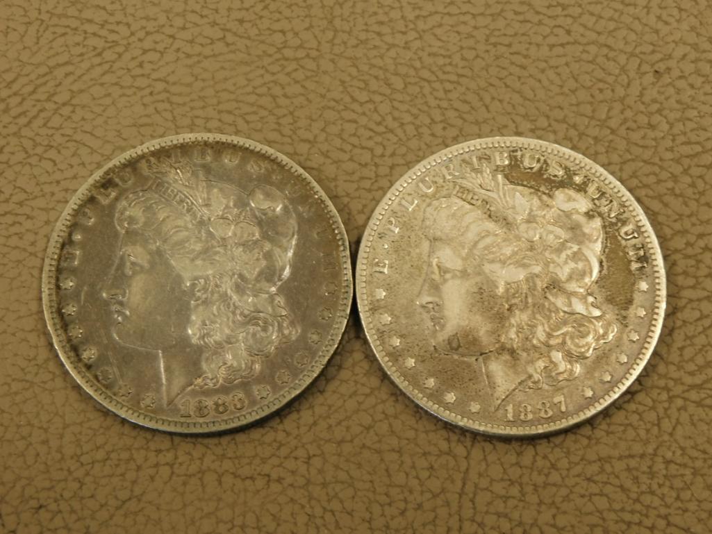 Two Morgan Silver dollar coins