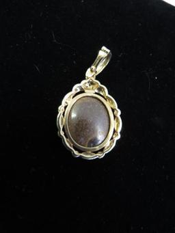14K Gold and Carved Opal Pendant