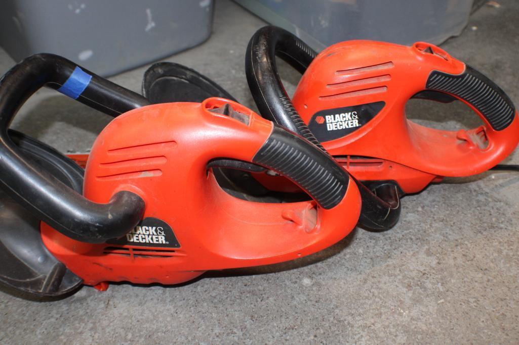 Two Electric Black and Decker Hedge Hogs
