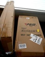 Two PGM Golf Swing Trainers