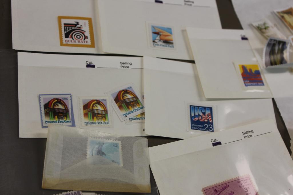 Collection of Unused US Postage Stamps with 2 Embossed 3 Cent Envelopes with Errors