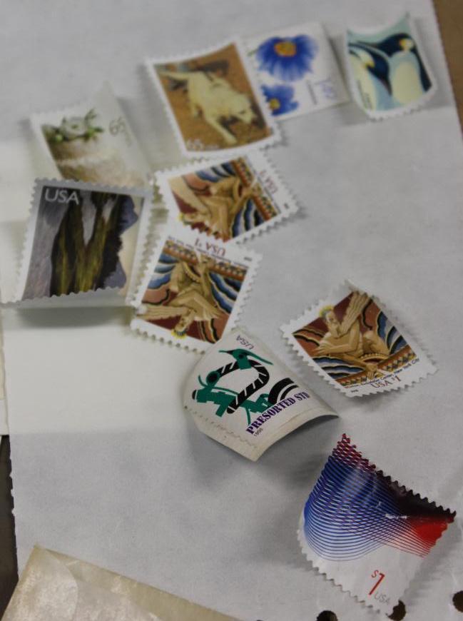 Collection of Unused US Postage Stamps with 2 Embossed 3 Cent Envelopes with Errors