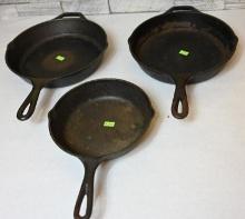 Three Lodge Cast Iron Skillets