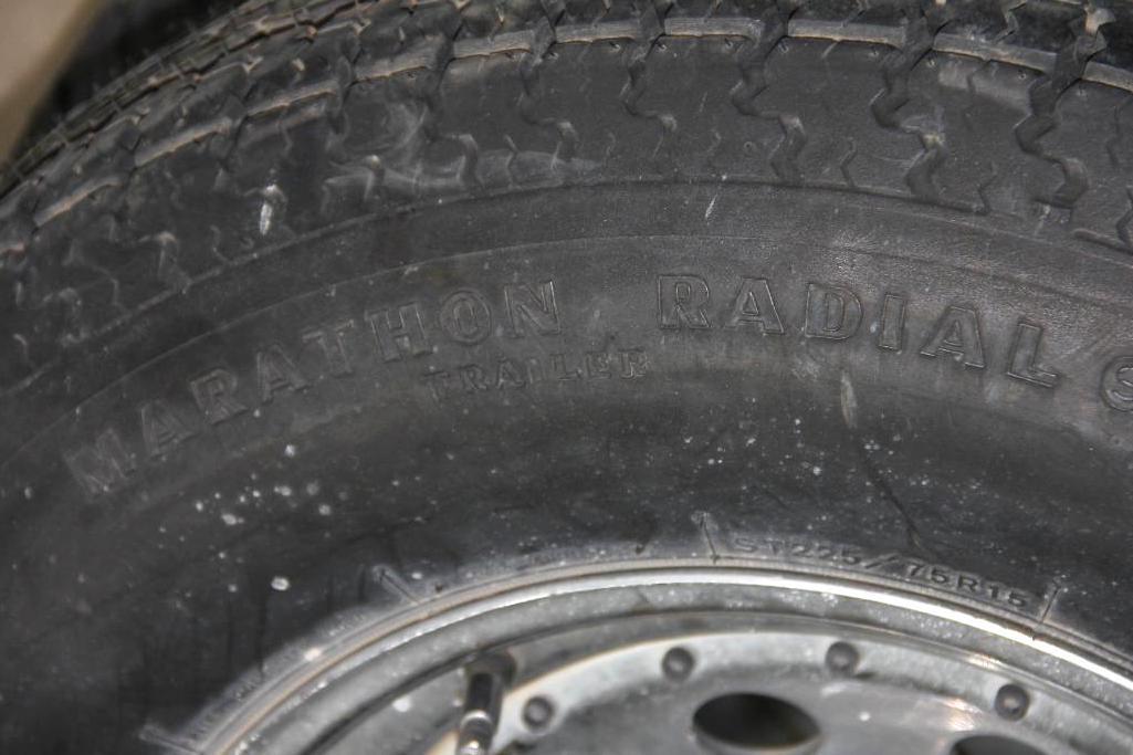 Two ST225/75 R215 Truck Tires on Wheels